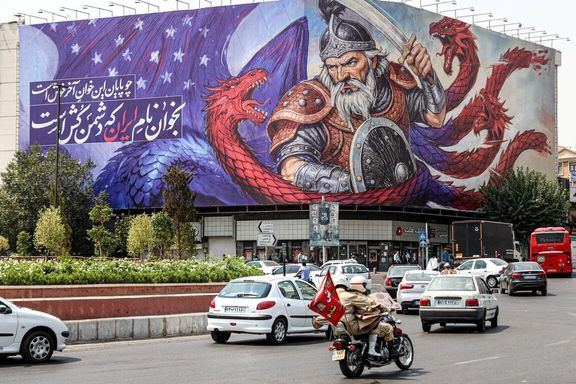 A billboard in central Tehran depicting the legendary Iranian figure, Rostam, fighting a seven-headed dragon, July 30, 2025