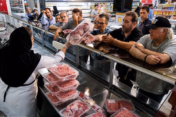 People queuing to buy meat at a superstore in Tehran