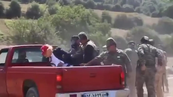 A screengrab from the viral video of Trump's mock arrest